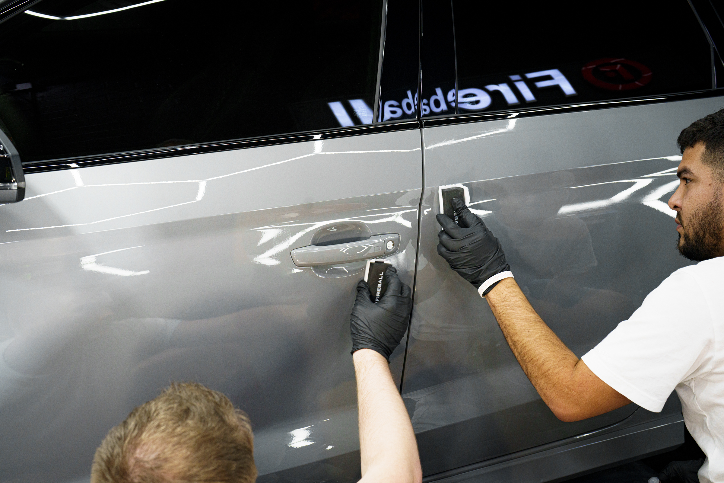 Fireball Installers prepare to coat an Audi RS3 Quattro with Fireball Ceramic Coatings